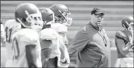  ?? NWA Democrat-Gazette/ANDY SHUPE ?? Arkansas Coach Bret Bielema directs players before Saturday’s scrimmage at Reynolds Razorback Stadium in Fayettevil­le. The Razorbacks will hold an open practice next Saturday as part of Fan Day.