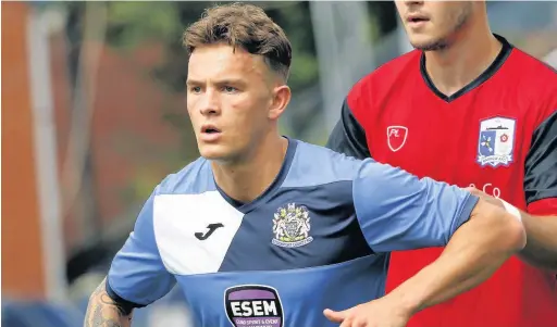  ??  ?? ●●Ben McKenna in action for Stockport County against Barrow on Saturday