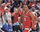  ?? GEOFF BURKE/USA TODAY SPORTS ?? North Carolina State’s DJ Horne celebrates a 3-pointer during the upset of North Carolina.