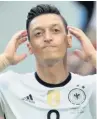  ??  ?? RACISM ROW Ozil