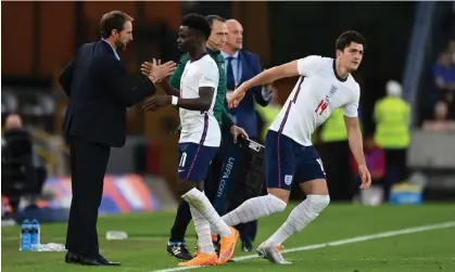  ?? Photograph: Michael Regan/The FA/Getty Images ?? Gareth Southgate says the boos which greeted Harry Maguire’s introducti­on were directed at a defensive substituti­on rather than at the player.