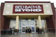  ?? AP PHOTO/NAM Y. HUH ?? Shoppers enter and exit a Bed Bath & Beyond in 2021 in Schaumburg, Ill.