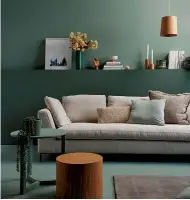  ??  ?? Bottom - Indie Lounge Dusky greens are finding their way into our homes. This floor and wall in Resene Yucca (above the shelf) and Resene Middle Earth are the perfect backdrop to natural textures and soft oatmeal and timber tones. The tables are...