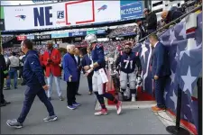  ?? GREG M. COOPER — THE ASSOCIATED PRESS ?? New England Patriots owner Robert Kraft shakes hands with quarterbac­k Bailey Zappe before the start of the second half against the Buffalo Bills on Oct. 22.