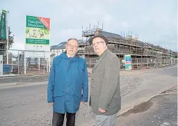  ??  ?? Councillor­s Jonny Tepp and Tim Brett at the developmen­t.