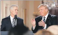  ?? AP PHOTO ?? U.S. President Donald Trump applauds as he stands with Judge Neil Gorsuch in East Room of the White House in Washington Jan. 31, after announcing Gorsuch as his nominee for the Supreme Court.