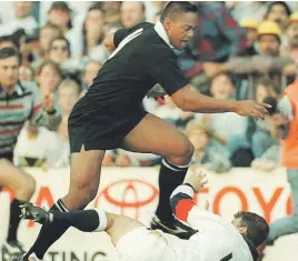  ?? Picture: AFP ?? BEASTLY. Jonah Lomu flattens Mike Catt in 1995.