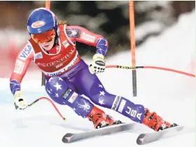  ?? Frank Gunn / Associated Press ?? U.S. skier Mikaela Shiffrin speeds toward victory in a World Cup downhill race — her first in the discipline this season — in Lake Louise, Alberta.