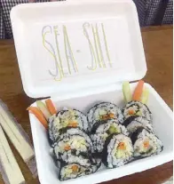  ??  ?? How they roll: Sea-Shi Sushi serves sushi rolls with a twist.