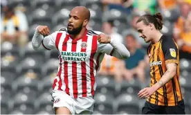  ??  ?? David McGoldrick celebrates after scoring his and Sheffield United’s second goal. Photograph: Ed Sykes/Action Images