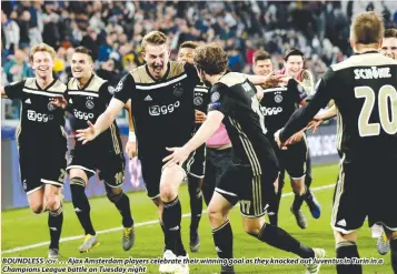  ??  ?? BOUNDLESS . . . Ajax Amsterdam players celebrate their winning goal as they knocked out Juventus in Turin in a JOY Champions League battle on Tuesday night