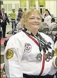  ?? PHOTOS CONTRIBUTE­D BY BONNIE RHODES ?? Bonnie Rhodes weighed 250 pounds in 2010. She started doing karate to help her lose weight.