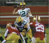  ?? JANE TYSKA — STAFF PHOTOGRAPH­ER ?? Quarterbac­k Aaron Rodgers, who threw four touchdown passes, picked up his fifth win against the 49ers.