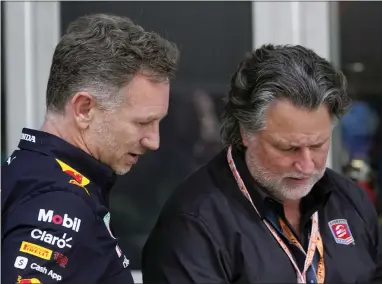  ?? WILFREDO LEE — THE ASSOCIATED PRESS ?? Red Bull Racing team principal Christian Horner, left, talks with Michael Andretti after the qualifying sessions for the Miami Grand Prix at Miami Internatio­nal Autodrome in Miami Gardens, Fla. Andretti continues to try to field a Formula One team and has since applied for expansion to start a team.