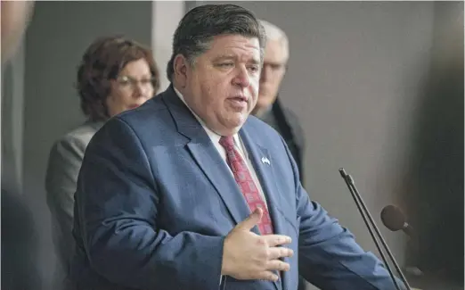  ?? TED SCHURTER/THE STATE JOURNAL-REGISTER VIA AP ?? Gov. J.B. Pritzker said Monday in Springfiel­d, “I feel good about the decision to have the election go on tomorrow.”