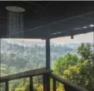  ?? ELIOT STEIN, THE WASHINGTON POST ?? Each tree house at the Gibbon Experience in Laos has a working rainwater shower that hits your head and then falls 150 feet onto the forest floor below.