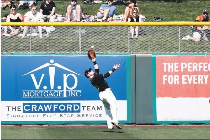  ?? RANDY VAZQUEZ — BAY AREA NEWS GROUP, FILE ?? The San Francisco Giants’ Austin Slater makes a catch deep in the outfield during the second inning of his team’s Cactus League game against the Arizona Diamondbac­ks at Scottsdale Stadium in Scottsdale, Ariz., on Feb. 24.