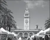  ?? JEFFREY GREENBERG/UNIVERSAL IMAGES GROUP VIA GETTY IMAGES ?? Visitors shop in Embarcader­o Plaza in San Francisco.