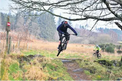  ?? ?? High flying One rider gets some air over a jump