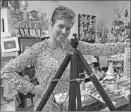  ?? CLAIRE BESSETTE/THE DAY ?? Erica Sullivan-Corbett, owner of Small Potatoes Artisan Crafts &amp; Unique Gifts, in her shop in the Yantic River Plaza at 204 Sturtevant St., Norwich. The shop will host a grand opening at 4:30 p.m. Tuesday.