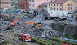  ?? PICTURE: ANSA/AFRICAN NEWS AGENCY/ANA ?? Worker remove rubble from the partially collapsed Morandi bridge in Genoa, Italy, yesterday. Italian authoritie­s, worried about the stability of remaining large sections of the bridge, evacuated about 630 people from nearby apartments.