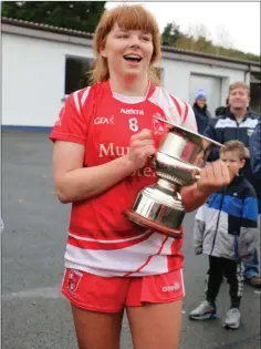  ??  ?? Tinahely Minor captain Aimee Maher addresses the crowd after receiving the cup.