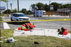  ?? TRAVIS DOVE / NYT ?? A city block is roped off with police tape in Charlotte, N.C., on Monday, where gunfire broke out at what appeared to be a multi-day block party connected to Juneteenth.