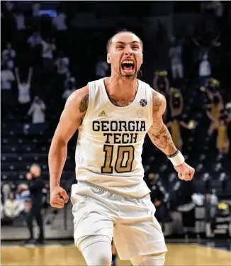  ?? HYOSUB SHIN/HYSOSUB.SHIN@AJC.COM ?? Georgia Tech guard Jose Alvarado celebrates the Yellow Jackets’ overtime win against Duke in a regular-season matchup March 2 in Atlanta.