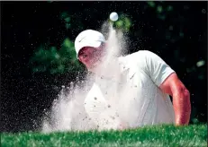  ?? (AP/John Raoux) ?? Rory McIlroy of Northern Ireland hits from a sand trap Sunday to the first green during the final round of the Arnold Palmer Invitation­al in Orlando, Fla. McIlroy said he would like to see the PGA Tour become “more cutthroat, more competitiv­e” by contractin­g instead of expanding.