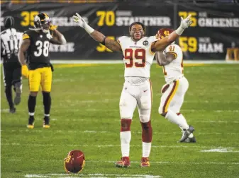  ?? Justin Berl / Associated Press ?? Washington defensive end Chase Young is enthused after his team surprised the Steelers at Heinz Field. Washington is 57 and tied for first in the NFC East with the New York Giants.