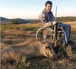  ??  ?? A very happy Piet with his first warthog.