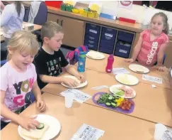  ??  ?? Healthy thinking These pupils made some tasty sandwiches