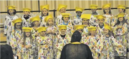  ??  ?? Last Tuesday, Ms. Montague’s PreK class had their graduating program with songs for friends and family in the school auditorium.