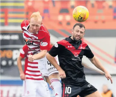  ??  ?? Heads you win Ziggy Gordon is first to the ball before Airdrie’s Dale Carrick