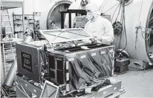  ?? JAMES DRUMMOND ?? The MOPITT (Measuremen­t of Pollution in the Tropospher­e) instrument undergoes testing at the University of Toronto in the mid-1990s.