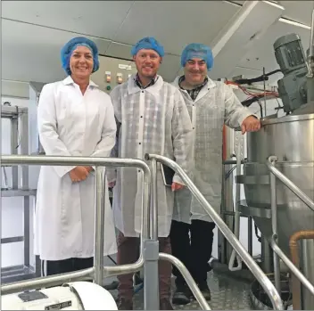  ??  ?? Jamie Greene (centre) with Lesley Jameson and Charles MacVicar supervisin­g a batch of chutney production