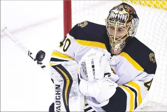  ?? Canadian Press photo ?? Boston Bruins goaltender Tuukka Rask (40) makes a save on a Toronto Maple Leafs shot during second-period NHL round one playoff hockey action in Toronto on Thursday.