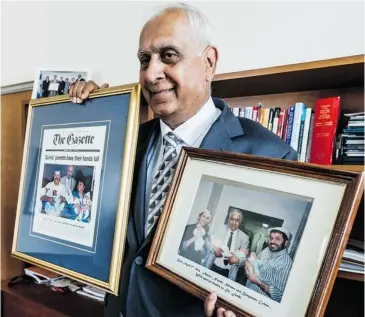  ?? DAVE SIDAWAY/ THE GAZETTE FILES ?? Dr. Arvind Joshi is retiring from St. Mary’s Hospital after 16 years as CEO in Montreal. Like a proud father, Joshi displays photos of quintuplet­s and quadruplet­s that he delivered.