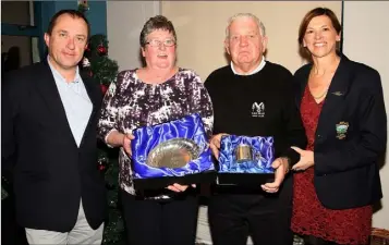  ??  ?? Bernie Furlong (Wexford), winner of the Solheim Cup, and Stan Parkinson who represente­d the rest of Ireland in the Men’s Captains’ Cup at the St. Helen’s awards presentati­ons with outgoing Captain Mick Conlon (left) and outgoing lady Captain Ann Byrne...