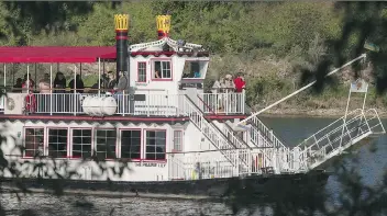  ?? GORD WALDNER ?? The Prairie Lily, a 120-passenger riverboat, makes its way down the South Saskatchew­an River. Dinner, Sunday brunch and tasting cruises are among the options that are sure to enhance your trip.