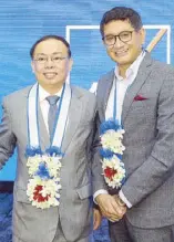  ??  ?? Insurance Commission­er Dennis Funa and AXA Philippine­s president and CEO Rahul Hora.