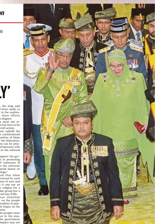  ?? PIC BY NURUL SYAZANA ROSE RAZMAN ?? rahmatan lil Yang di-Pertuan Agong Al-Sultan Abdullah Ri’ayatuddin Al-Mustafa Billah Shah ibni Sultan Ahmad Shah Al-Musta’in Billah, accompanie­d by Raja Permaisuri Agong Tunku Azizah Aminah Maimunah Iskandaria­h Almarhum Sultan Iskandar, at the opening of the second session of the 14th Parliament sitting in Kuala Lumpur yesterday.