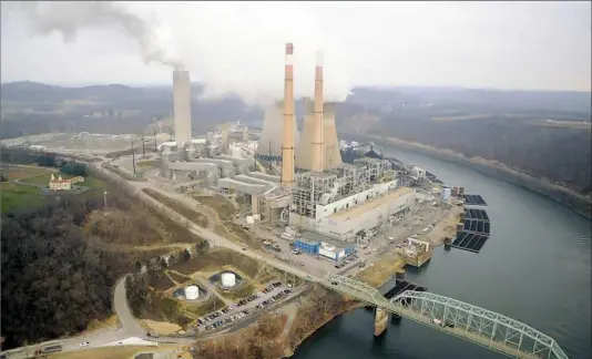  ??  ?? FirstEnerg­y Corp. closed Hatfield's Ferry, a 1,710 megawatt coal-fired power plant in Greene County, in 2013.