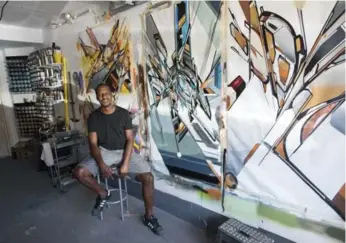  ?? J.P. MOCZULSKI FOR THE TORONTO STAR ?? Multimedia artist Evond “Mediah” Blake has created a studio “oasis” in the garage of his east-end Toronto home.