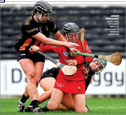  ?? ?? UNDER PRESSURE: Cork’s Amy O’Connor fights for possession in Kilkenny yesterday