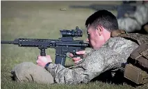  ??  ?? Soldiers at Waiouru Military Camp put the MARS-L rifle through its paces.