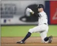  ?? MARY ALTAFFER - THE ASSOCIATED PRESS ?? In this Sept. 19, 2019, file photo, New York Yankees’ Brett Gardner gestures from second base after hitting an RBI double during the sixth inning of the teams’ baseball game against the Los Angeles Angels in New York. Gardner is returning to the Yankees for a 14th season.