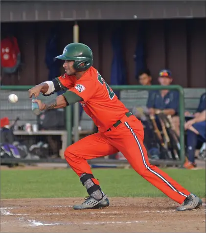  ?? STEVEN MAH/SOUTHWEST BOOSTER ?? Myles Miller tried to bunt his way on during a 6-1 loss to the visiting Weyburn Beavers on July 6.