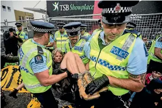  ?? PHOTO: ANDY JACKSON/FAIRFAX NZ ?? Police had to physically remove protesters, who wanted to delay the New Zealand Petroleum Conference 2017.