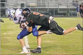  ?? Keith Deal ?? LaFayette linebacker Darian Stevens corrals Fannin County tailback Carson Beavers during Friday’s game in south Walker County. The Ramblers will be back at home on Friday to play host to Gordon Lee.